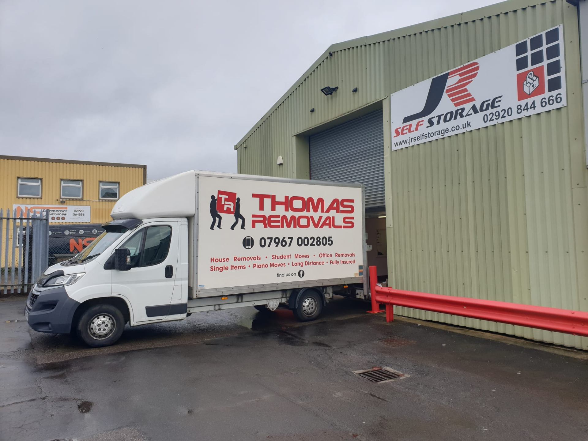 Thomas Removals branded van at a self-storage facility for secure storage removals