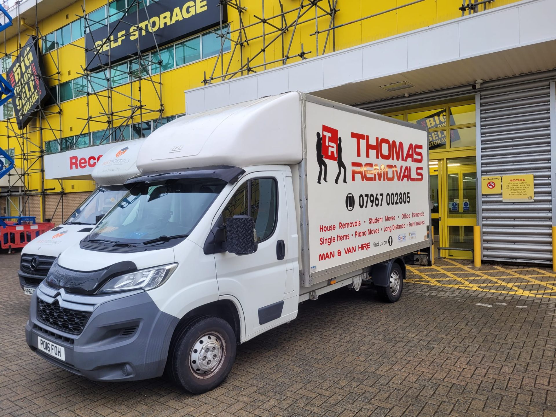 Thomas Removals van at a storage facility during an office relocation project